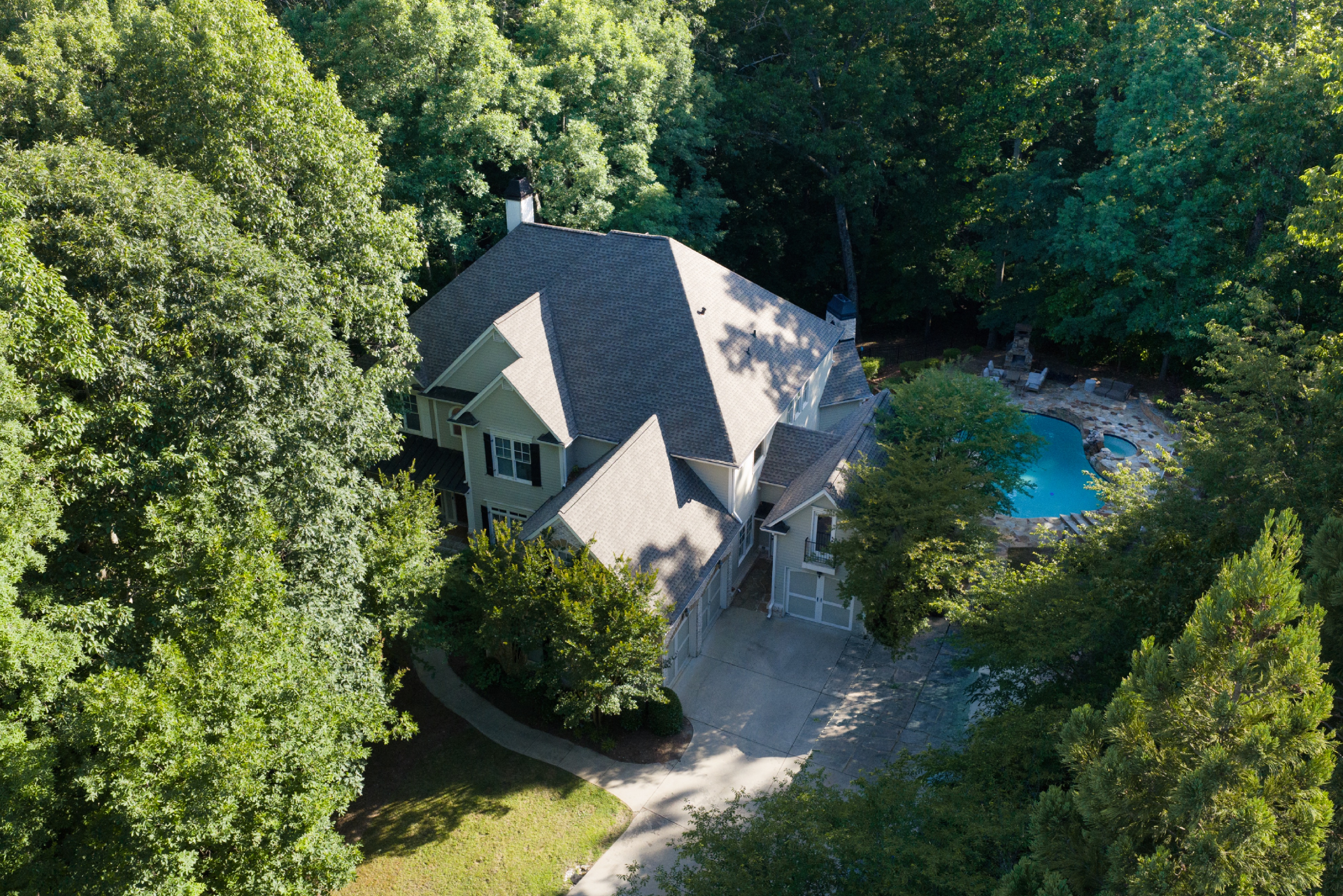 Elevated drone — full estate footprint